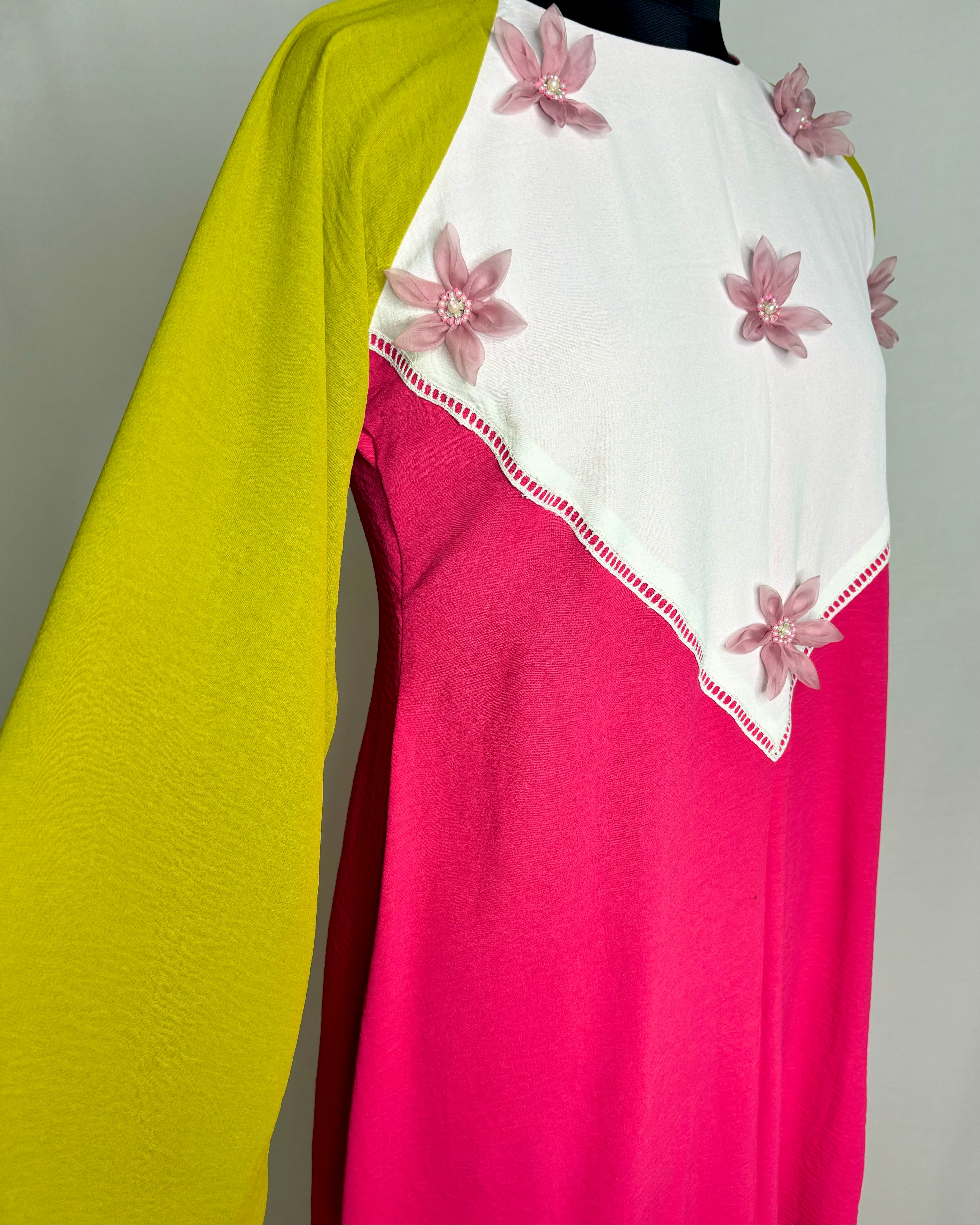 Elegant Cape Sleeve Top with White Patch and Pink Organza Flower Detailing